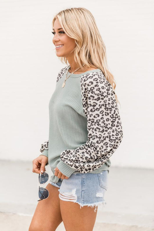 Fall from the Sky Animal Print Sleeve Waffle Blouse Sage