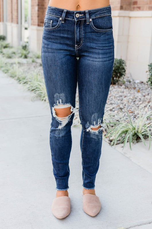 The Kallista Dark Wash Distressed Crop Jeans