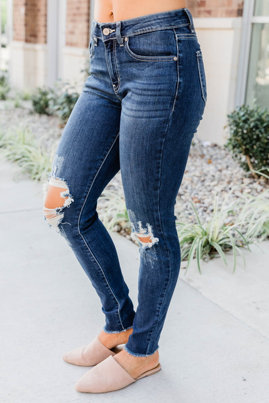The Kallista Dark Wash Distressed Crop Jeans